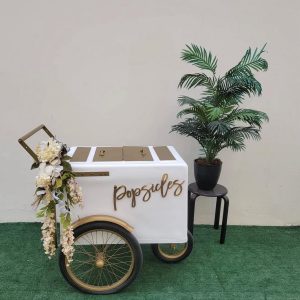 white and gold print cart